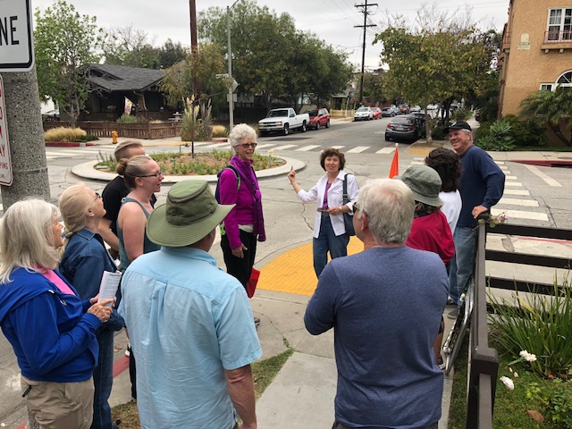 Eyes on the street, sidewalk, trees, traffic circles